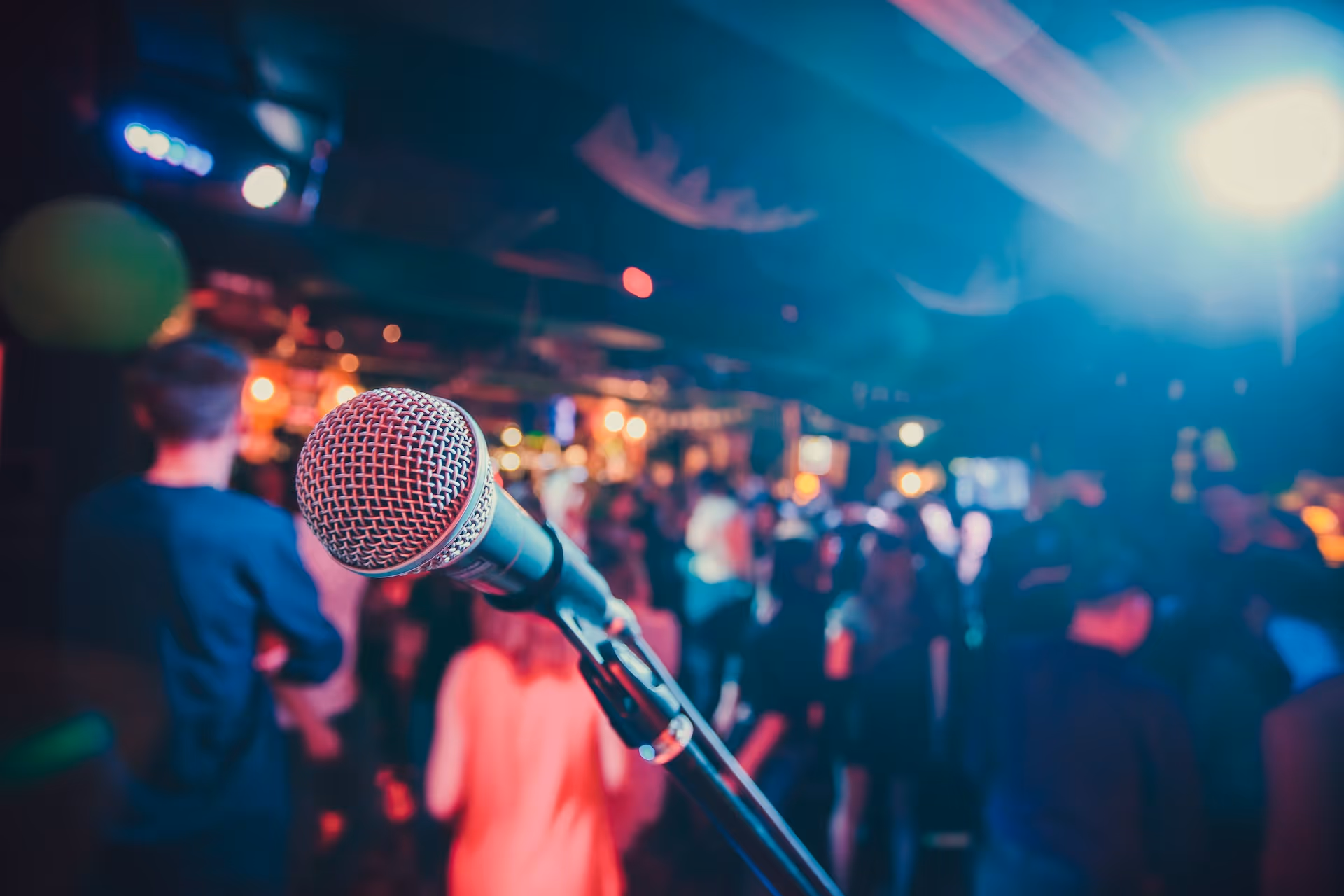 Microphone on stage against a background of auditorium