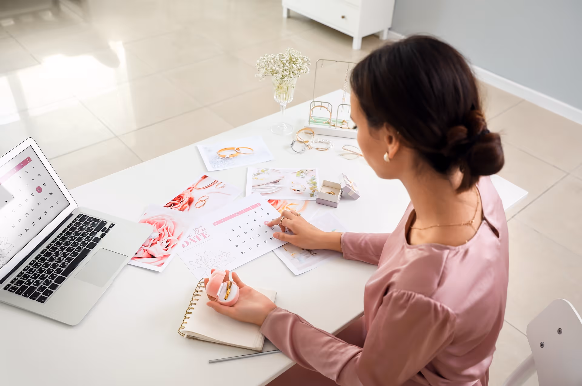 Female wedding planner working in office