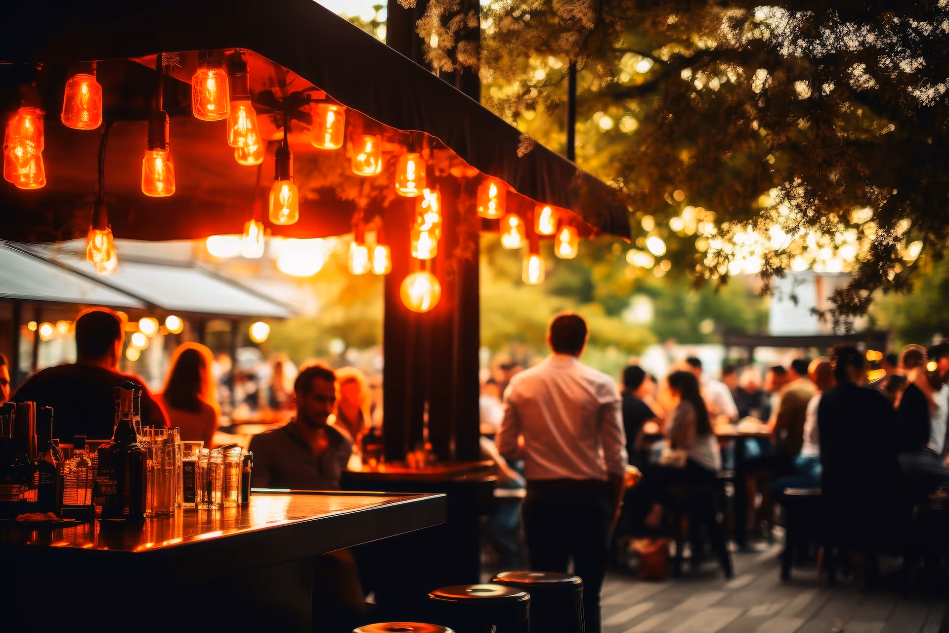 An outdoor bar and restaurant with people