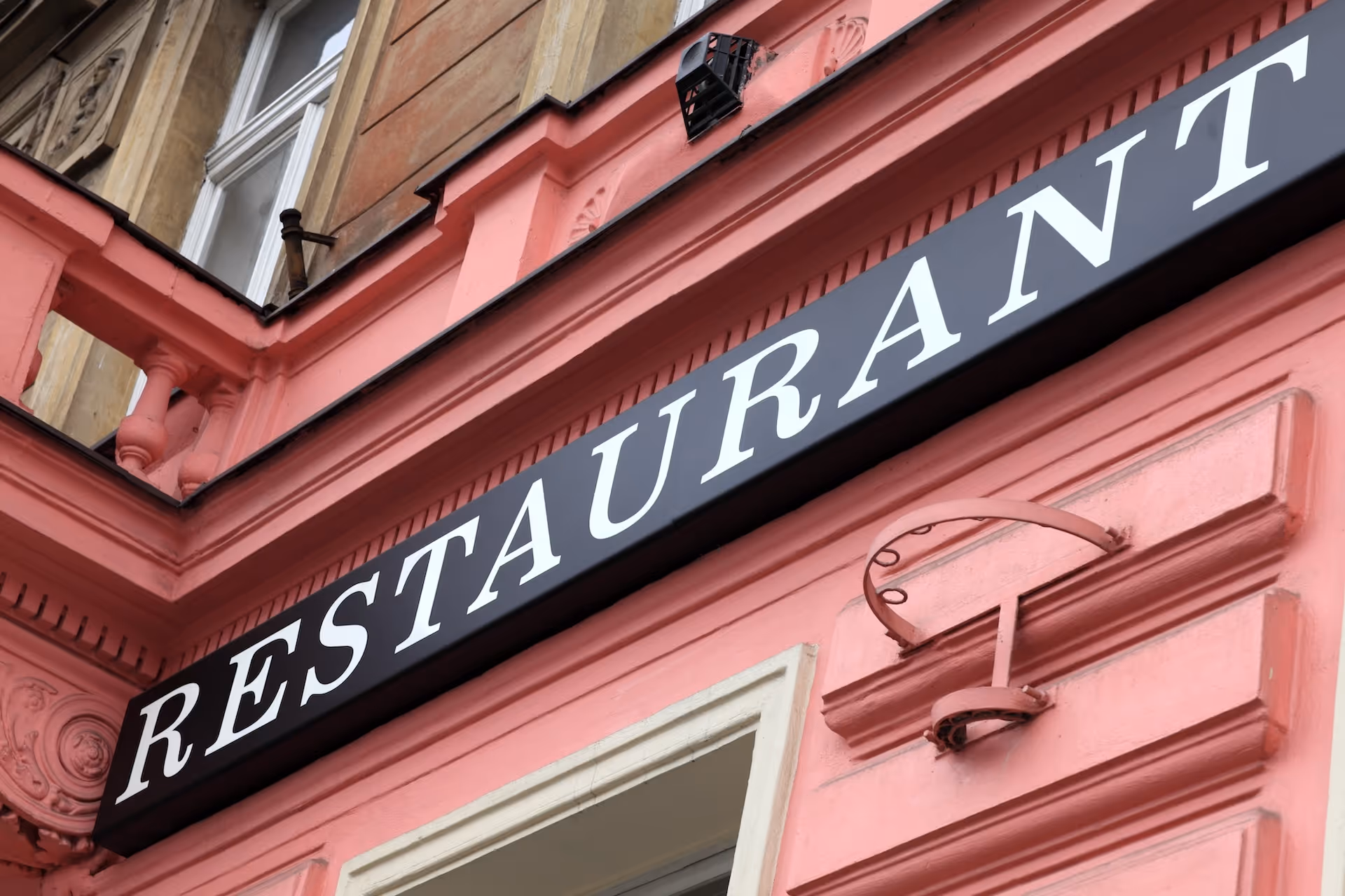 Restaurant sign on a wall