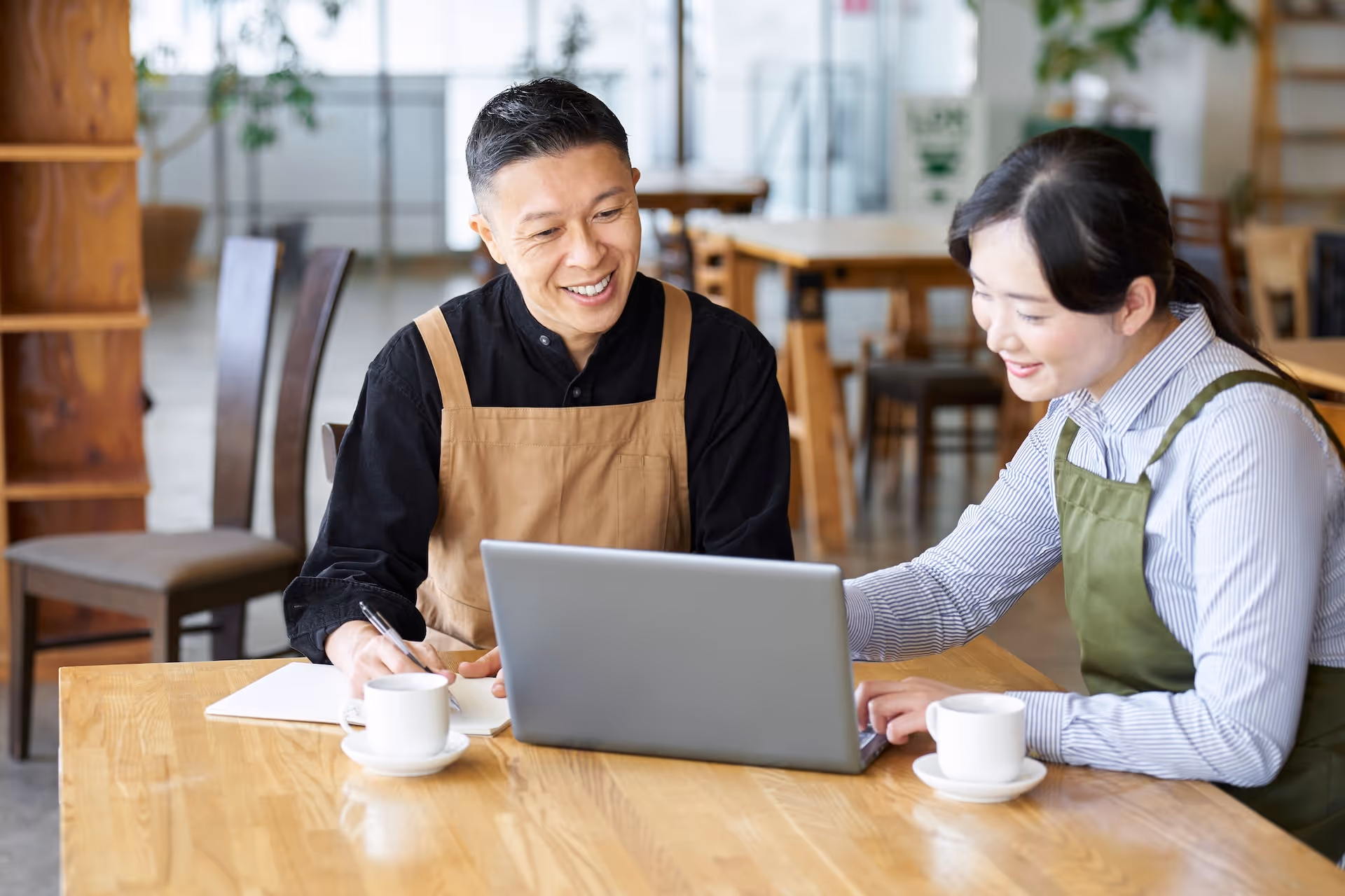 Two managers discuss restaurant profit margin