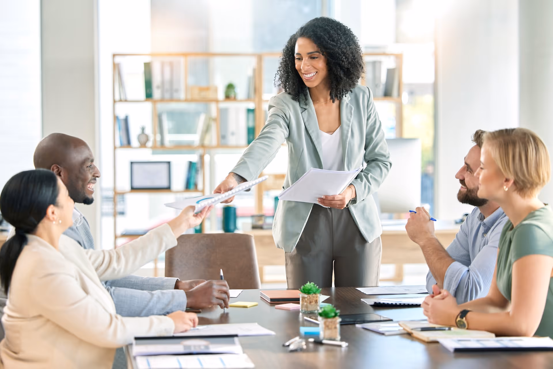 event manager hands out event proposal