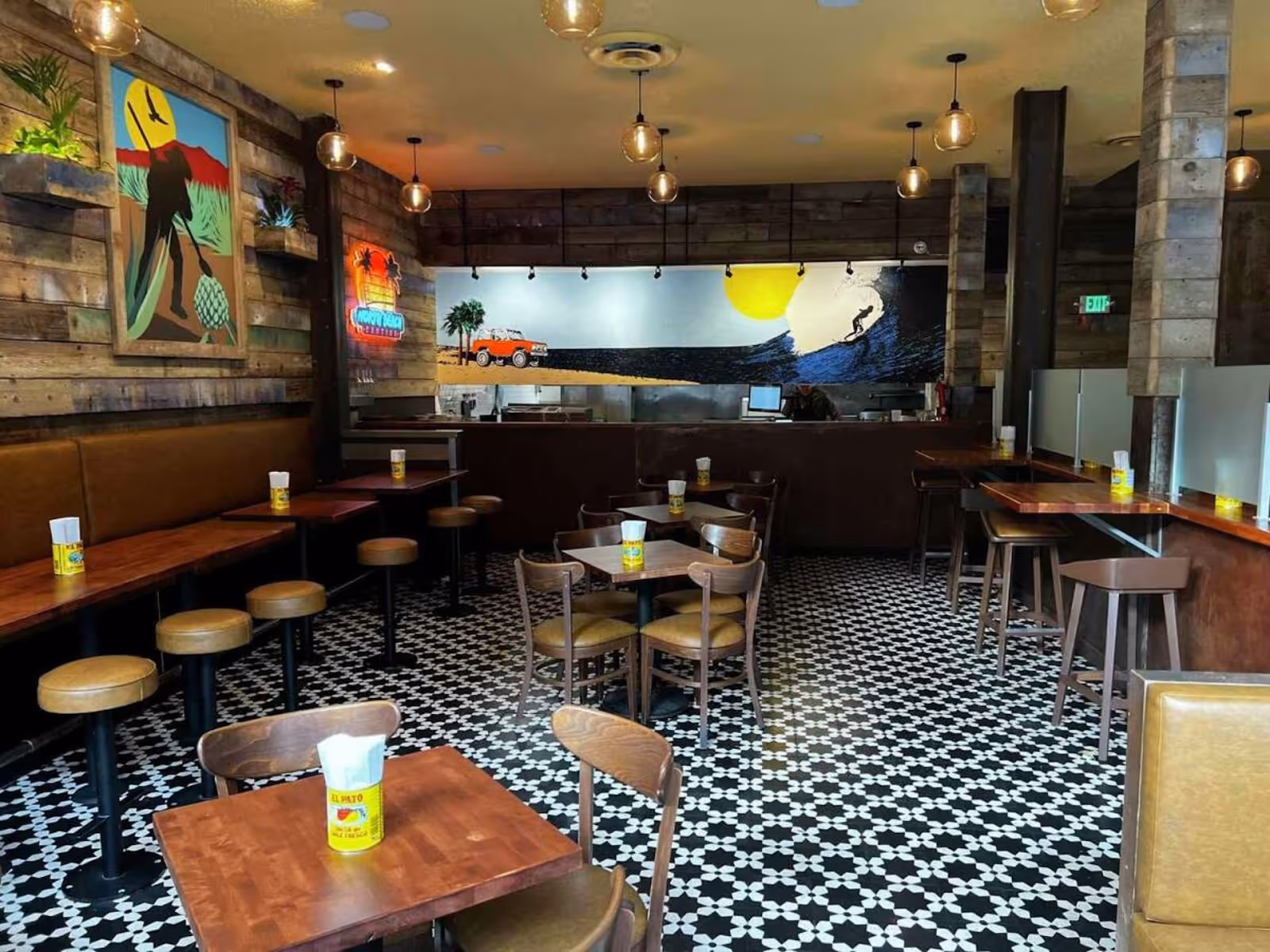 interior view of seating and kitchen at North Beach Cantina, SF
