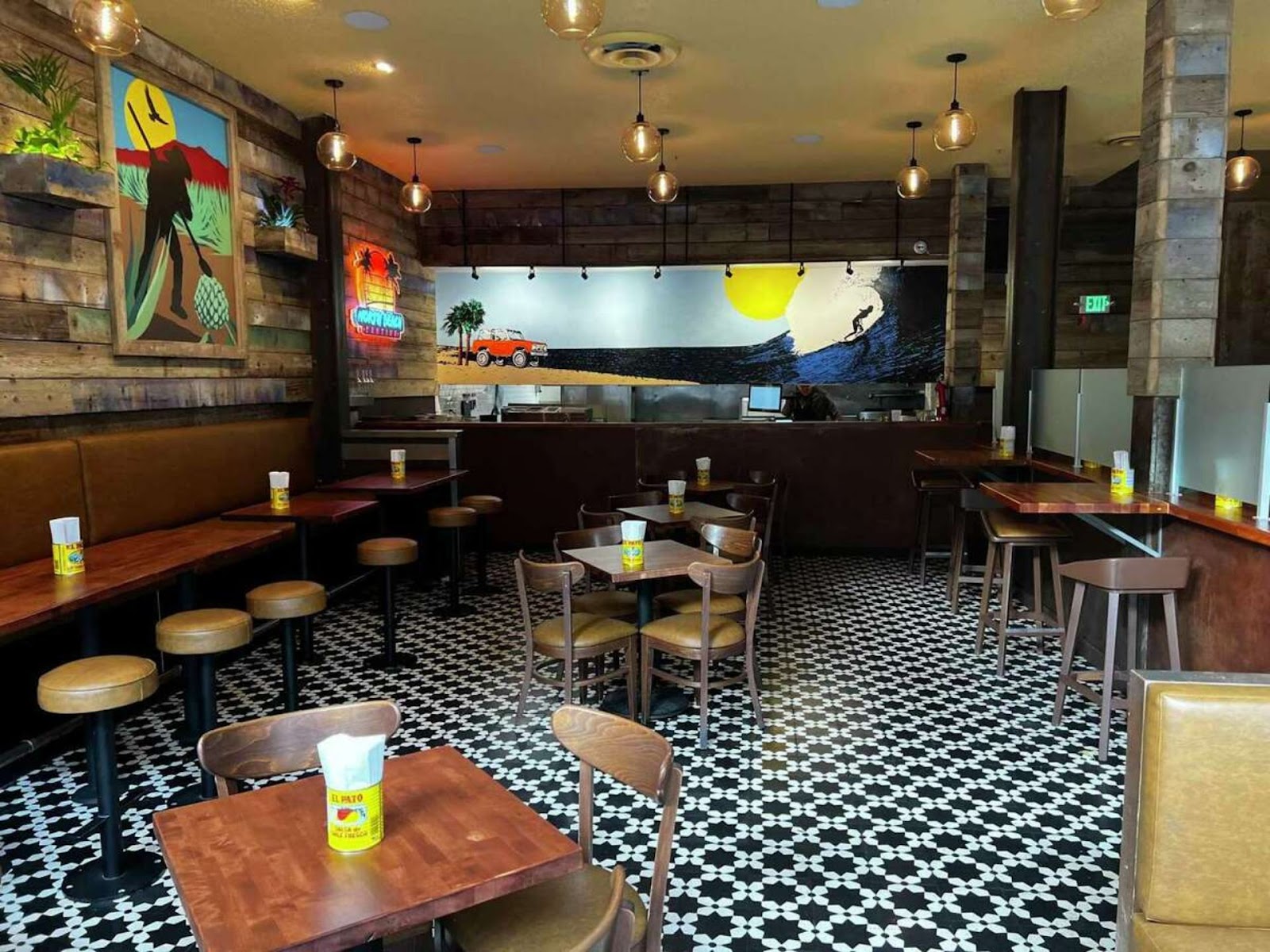 interior view of seating and kitchen at North Beach Cantina, SF
