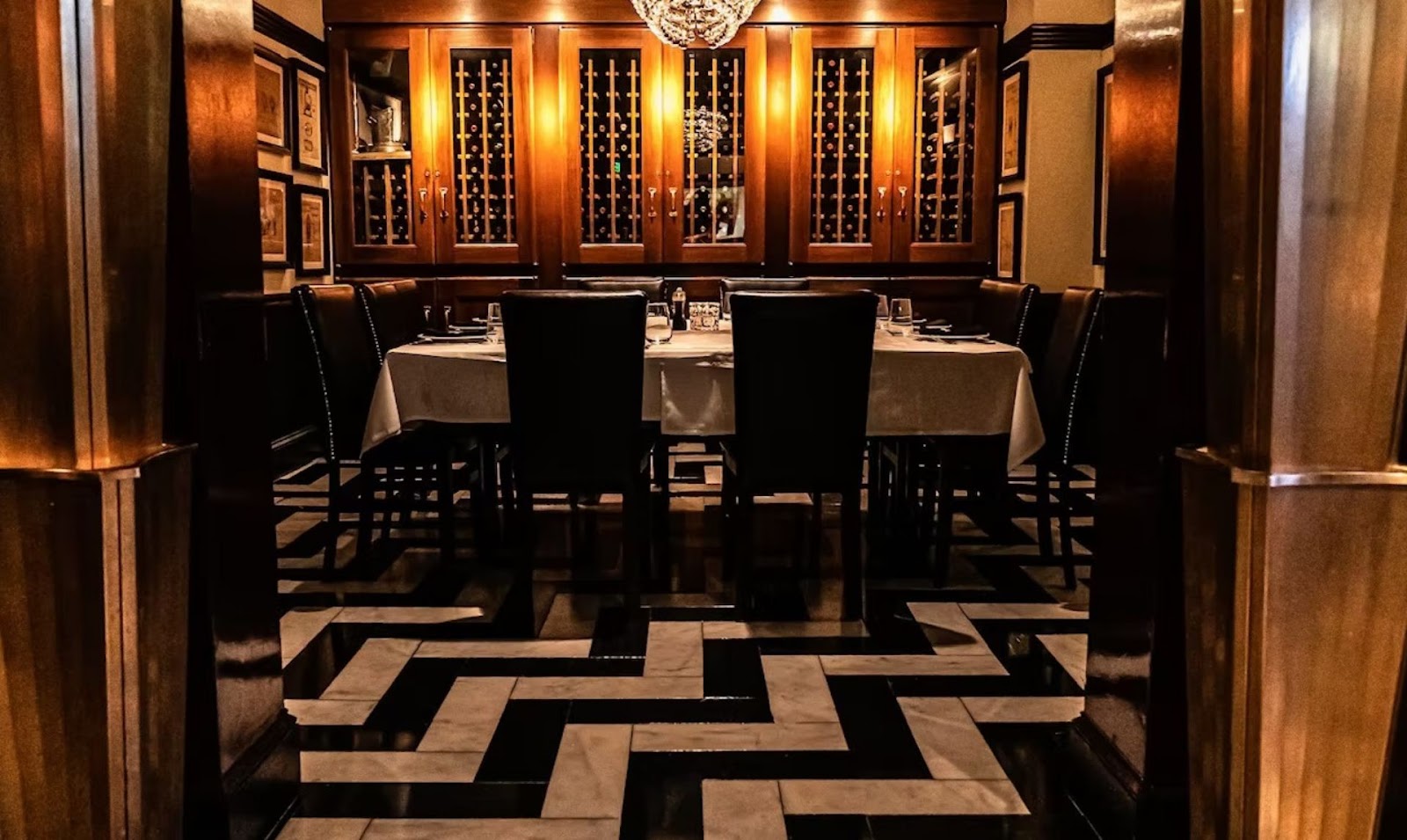 private room with a decked out dinner table at Osso Steakhouse