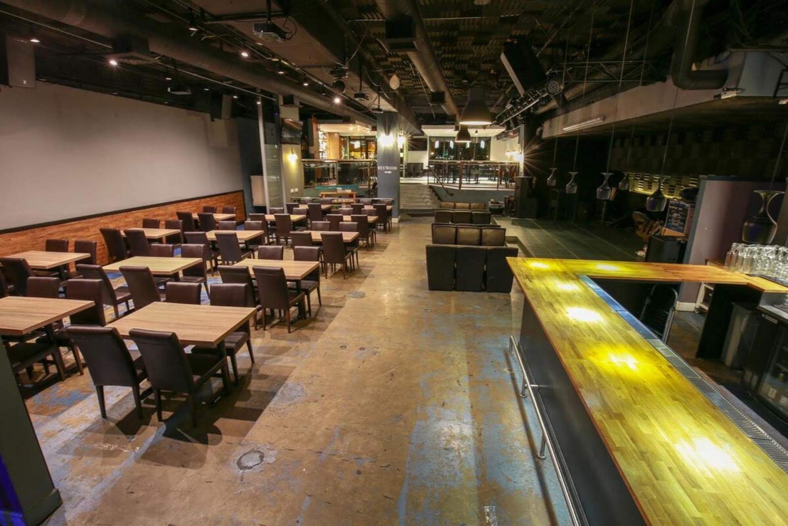 elevated view of seats and dining tables at Pa'ina Restaurant & Lounge