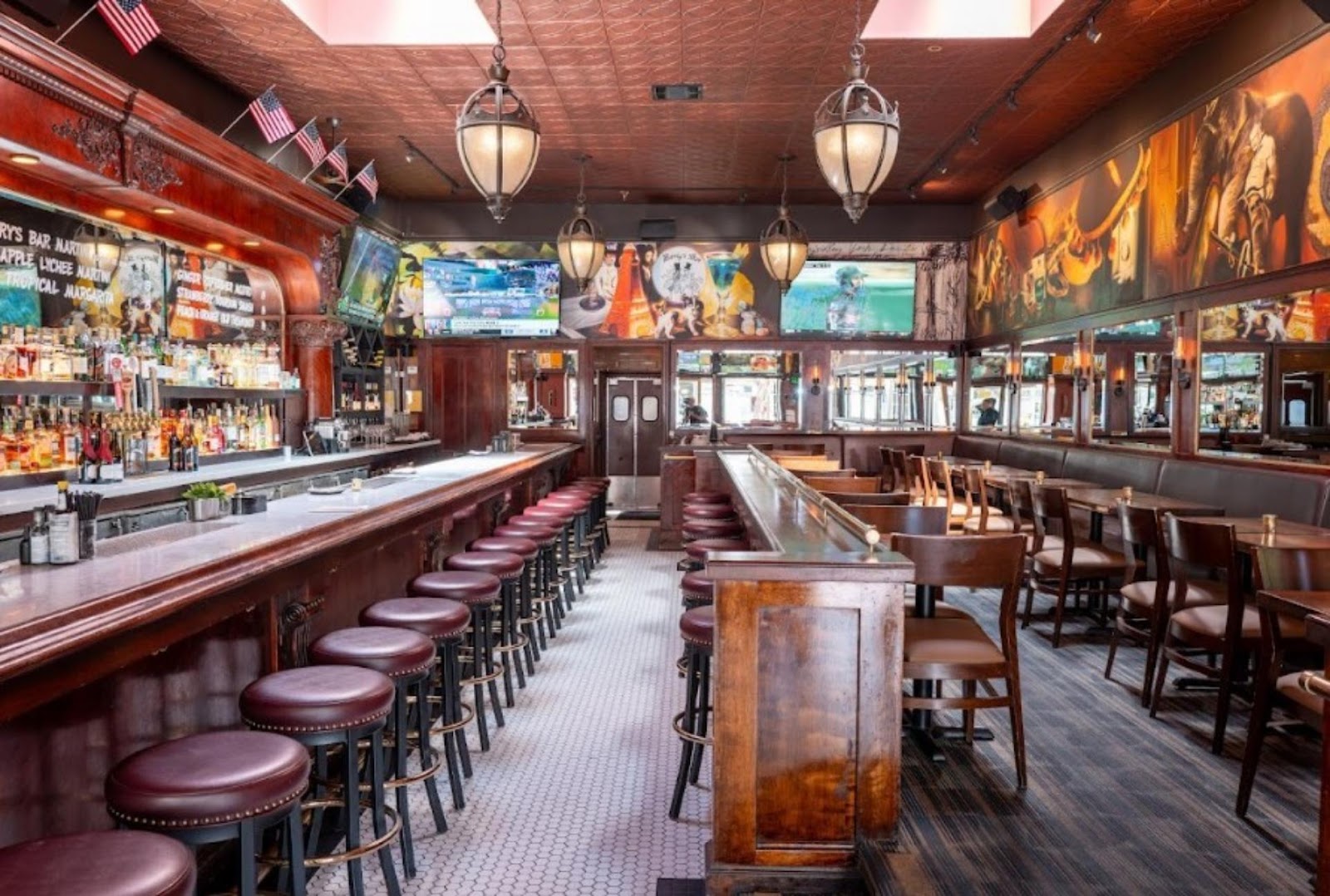 restaurant-wide view of Harry's Bar SF, with seating, dining, and fully-stocked bar