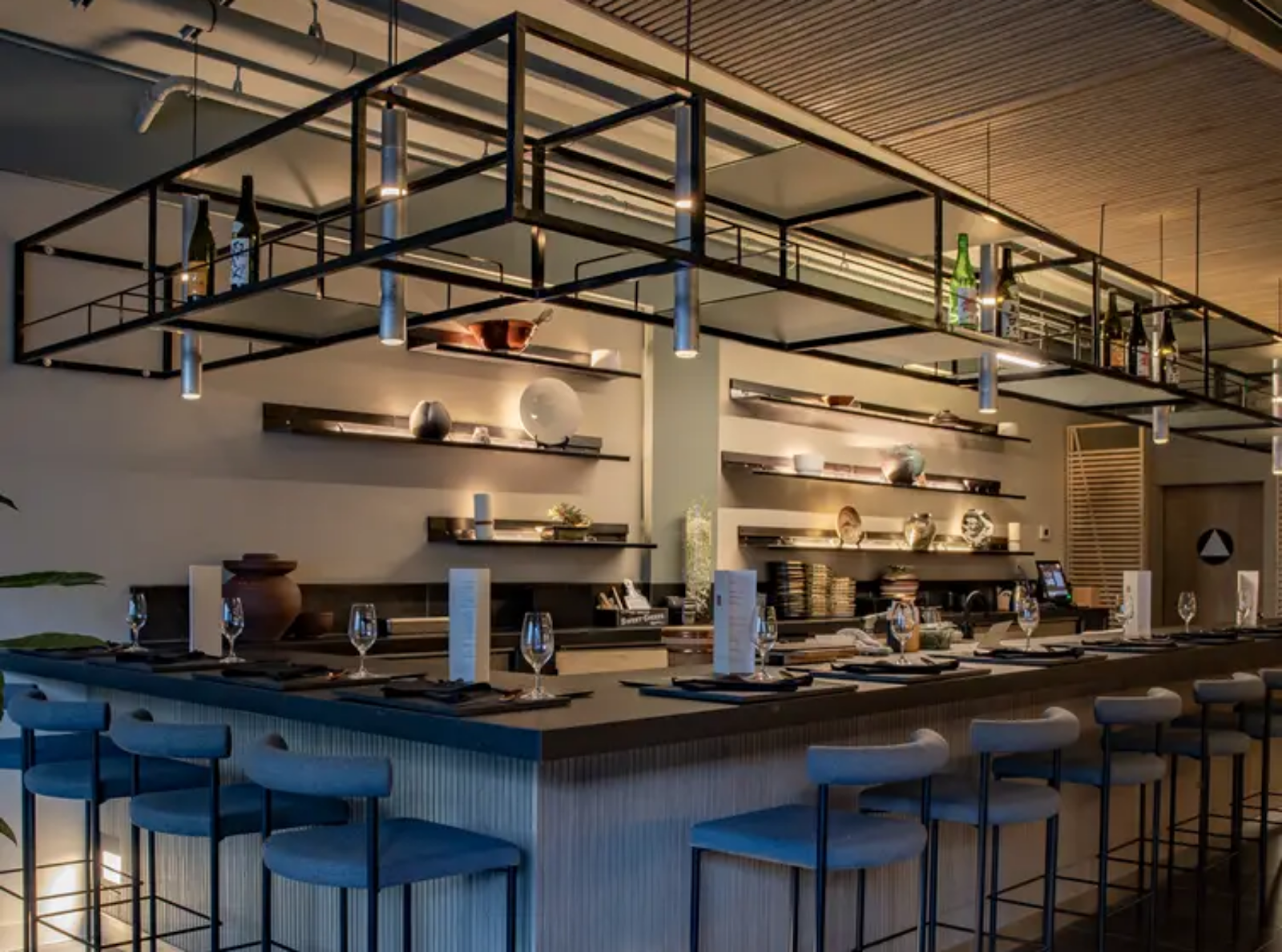long family-style dining table with chairs at Sushi Sato restaurant, Cathedral Hill SF