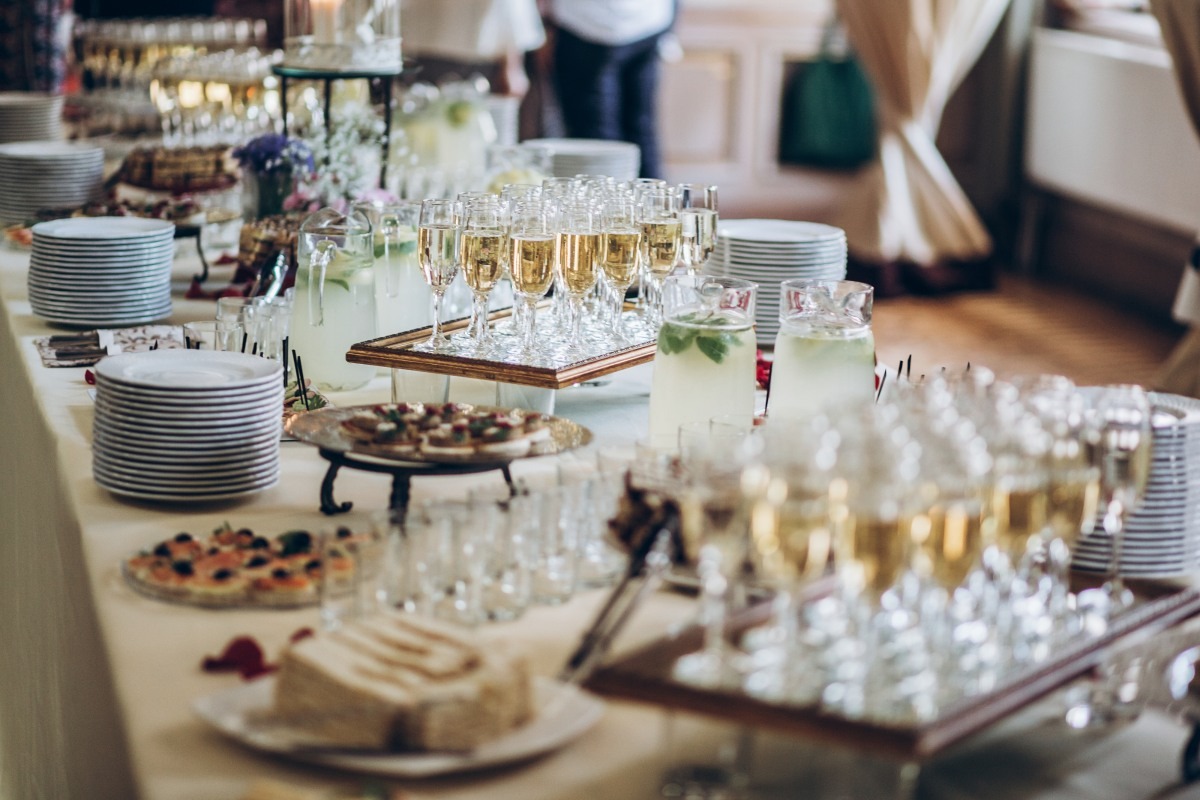 Event table with food and drinks set up