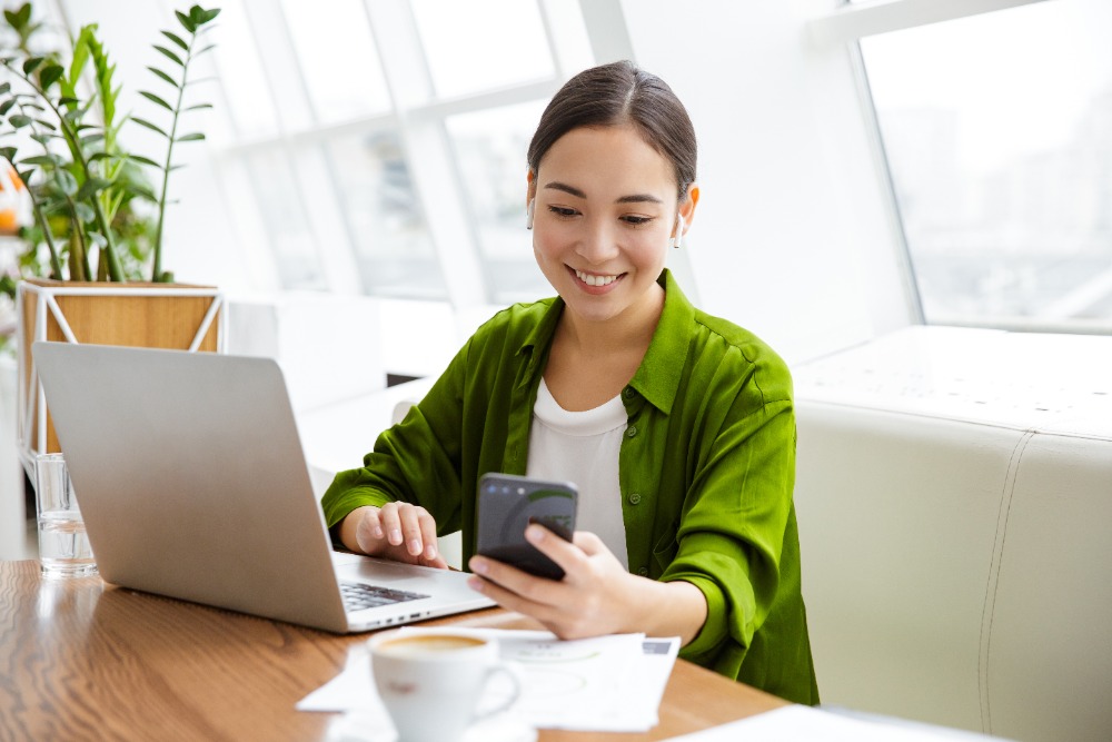 woman looking at phone