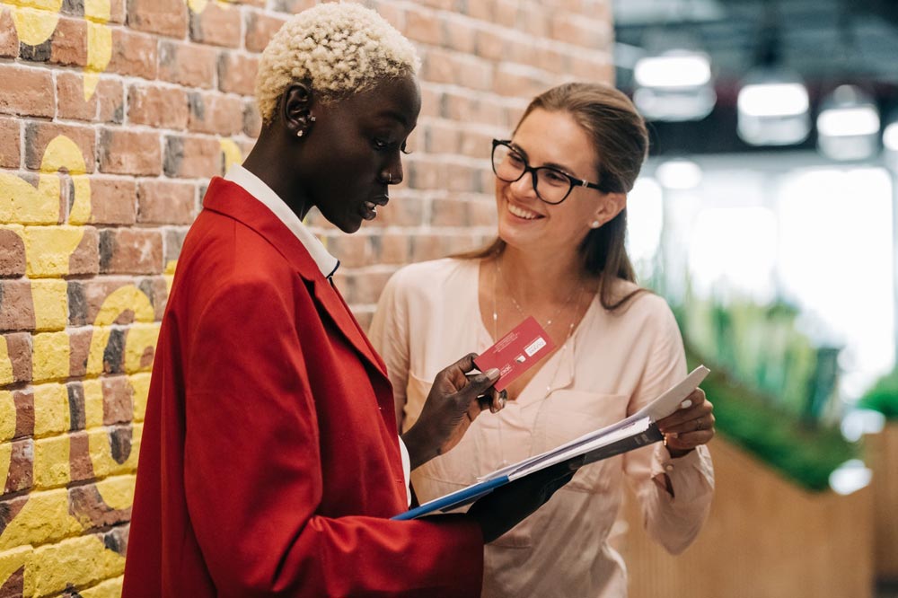 Women comparing Catering software integrations