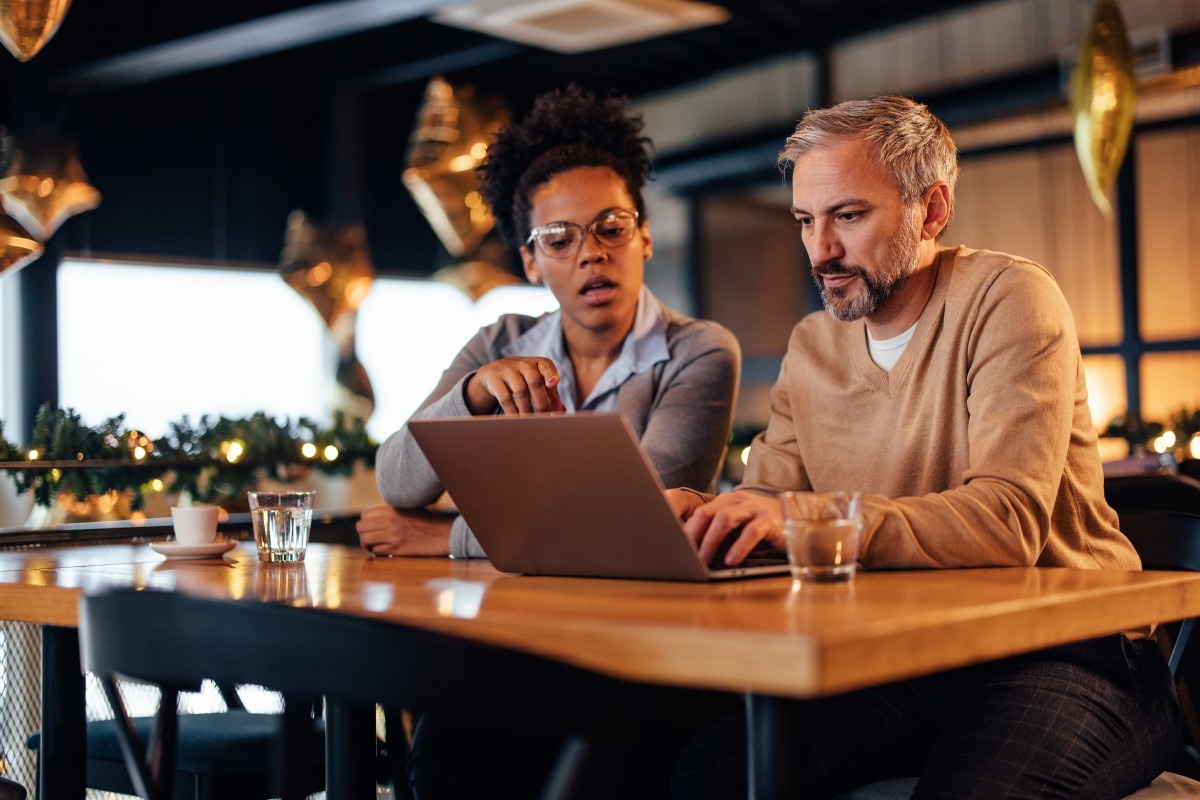 Restaurant managers choosing the best software