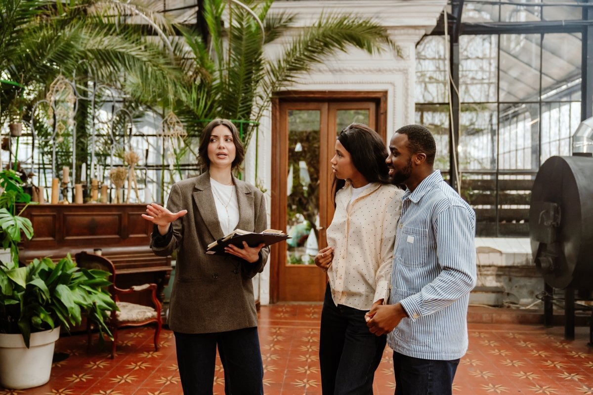 venue manager showing clients the event space