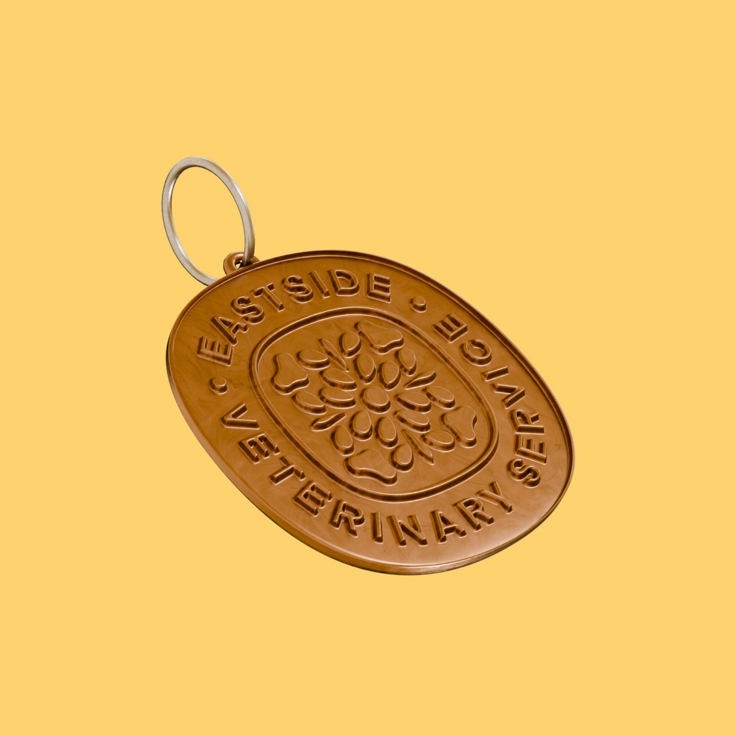 Copper dog tag with Eastside Veterinary Service logo