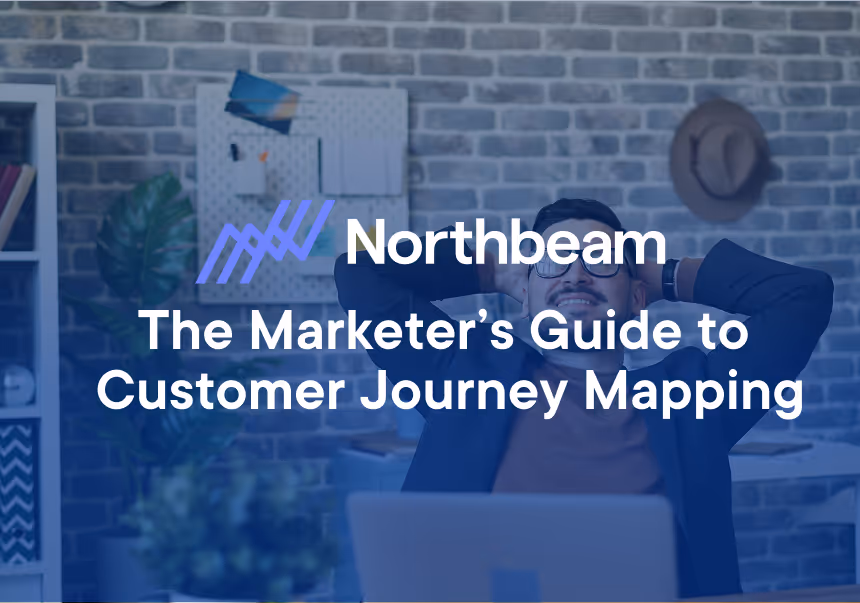Northbeam presents a marketer’s guide to customer journey mapping, featuring a relaxed professional at a desk, symbolizing strategic planning and marketing success.