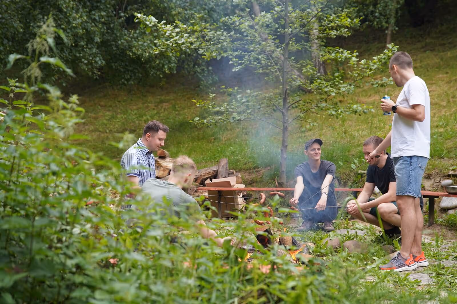 A photo of employees by the fire.