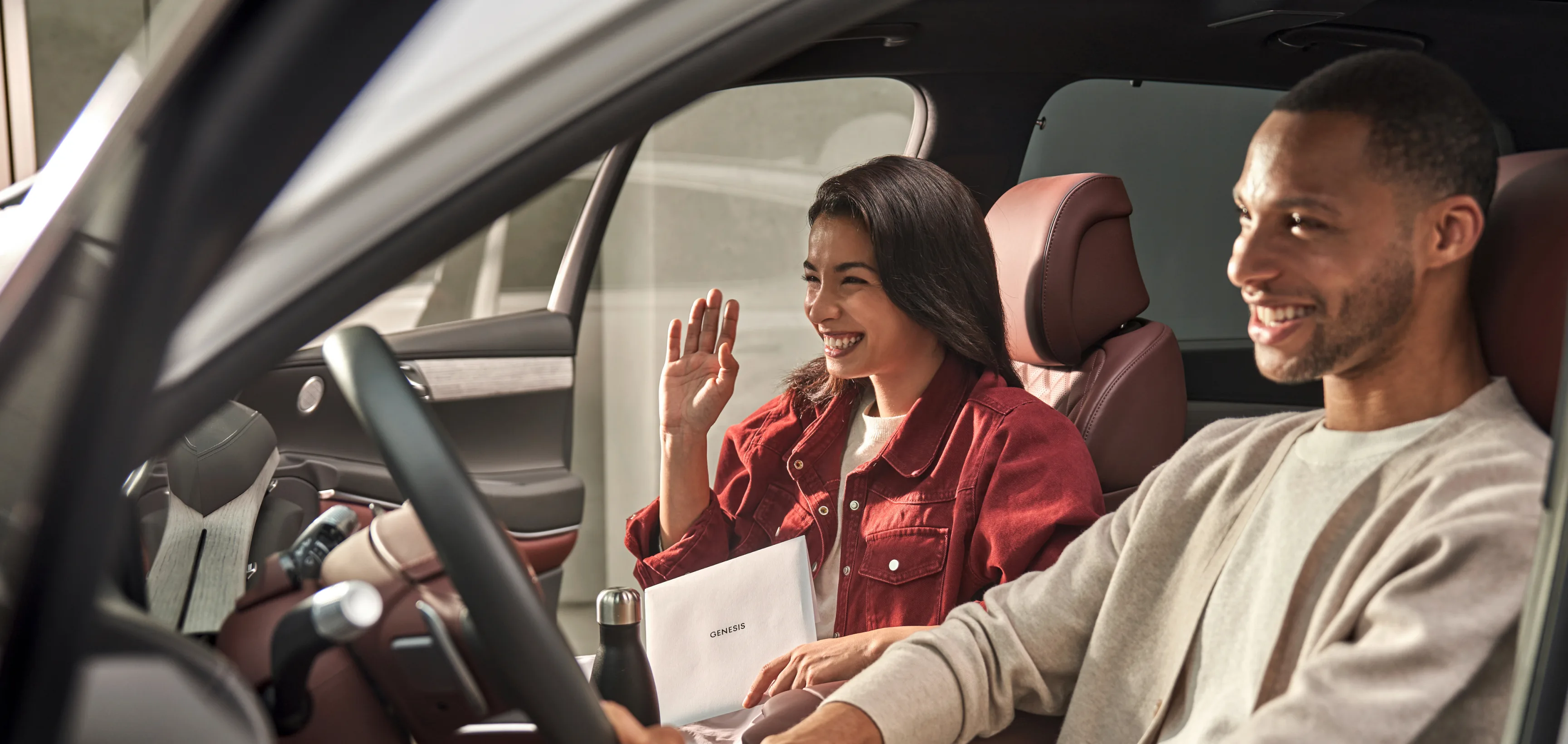 Woman driving in Genesis