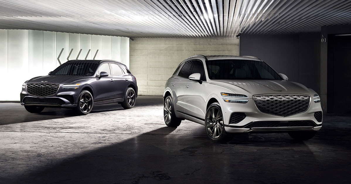 Front exterior view of two Genesis GV70 vehicles