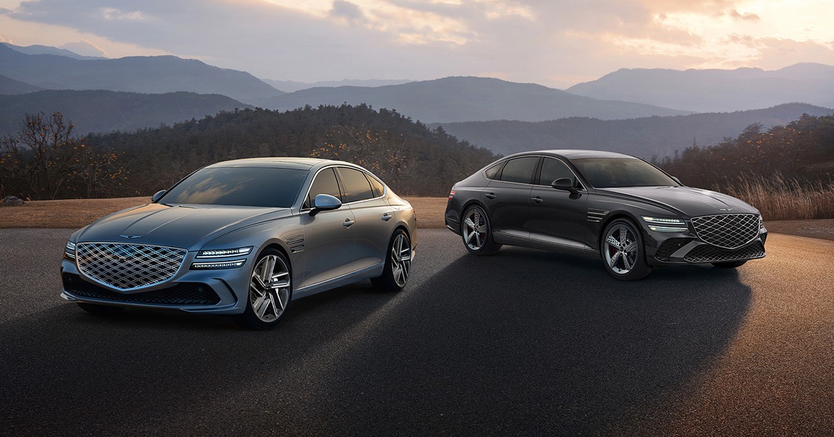 Front exterior view of two Genesis G80 vehicles