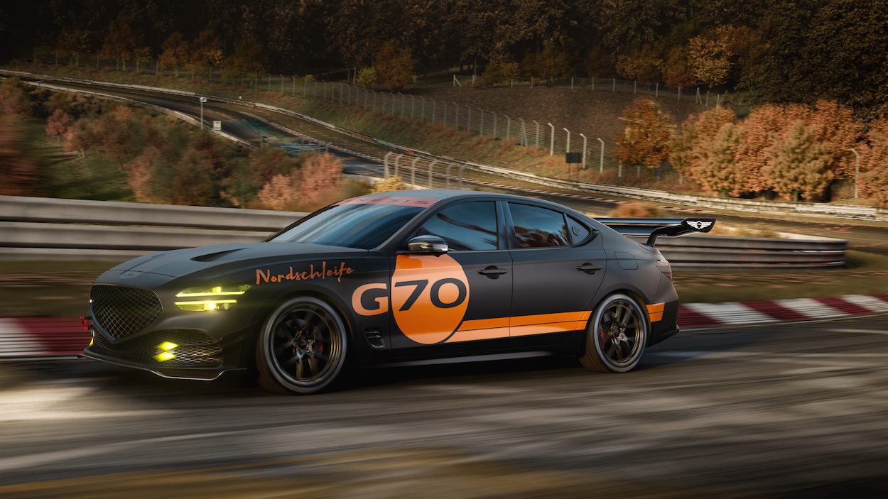 Couple driving Genesis vehicle
