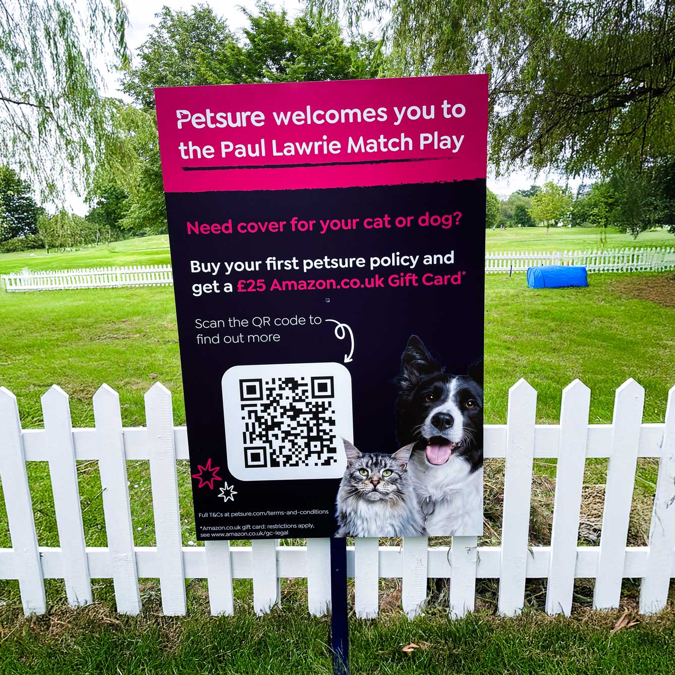 Petsure welcome and insurance offer board with cat and dog photo and QR code for a gift card promotion.