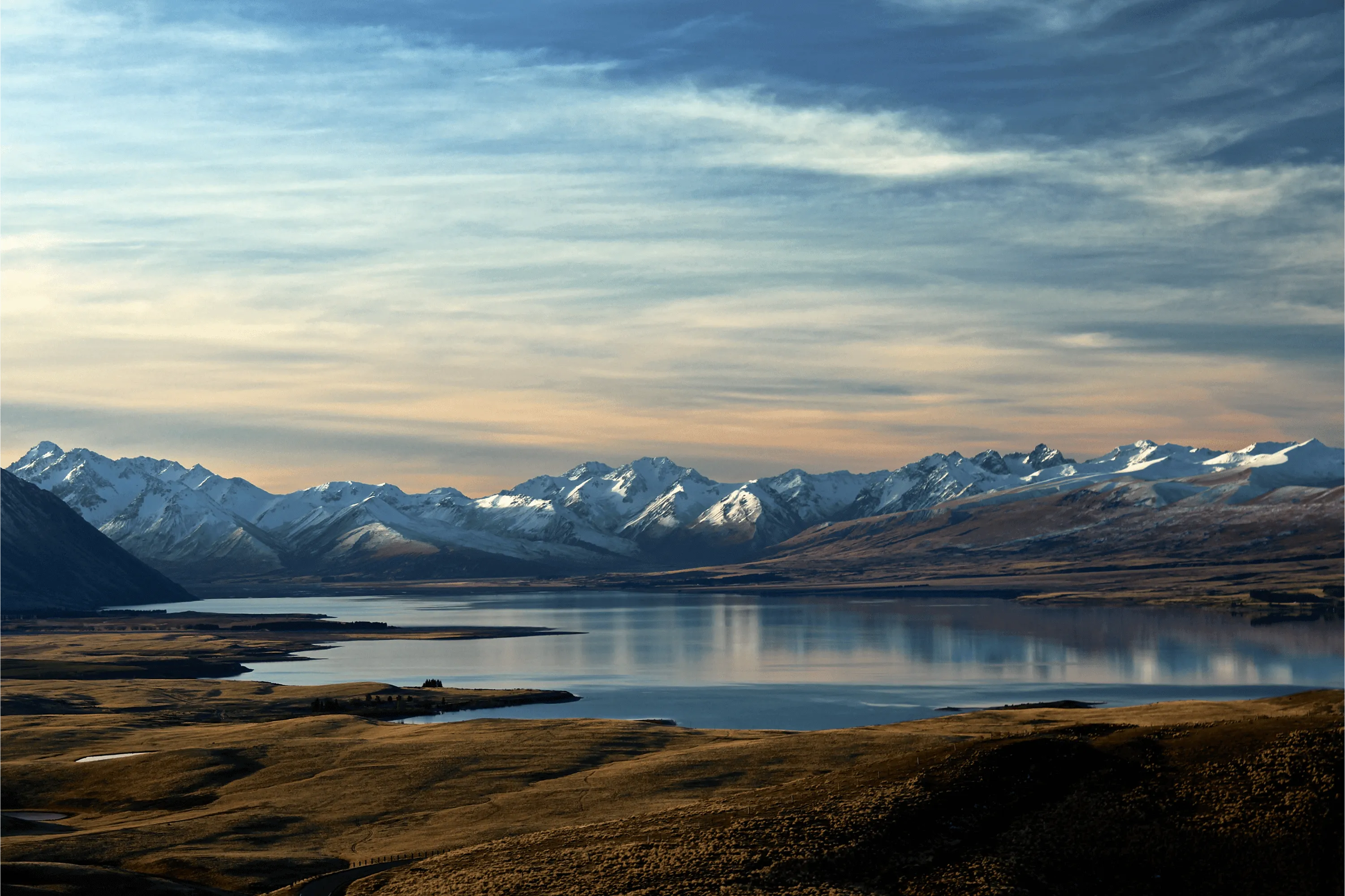 A wide view of a snowy mountain range