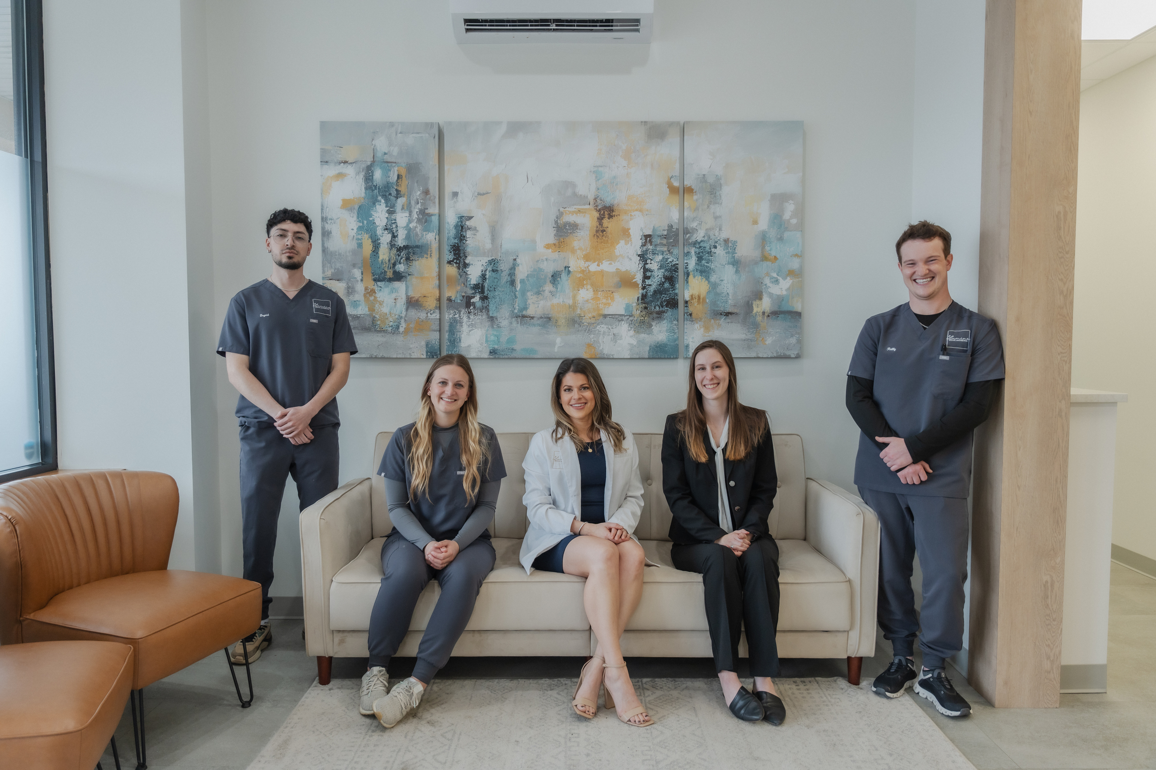 Dr. Grassi smiling for a photo at Luminé Dental Aesthetics