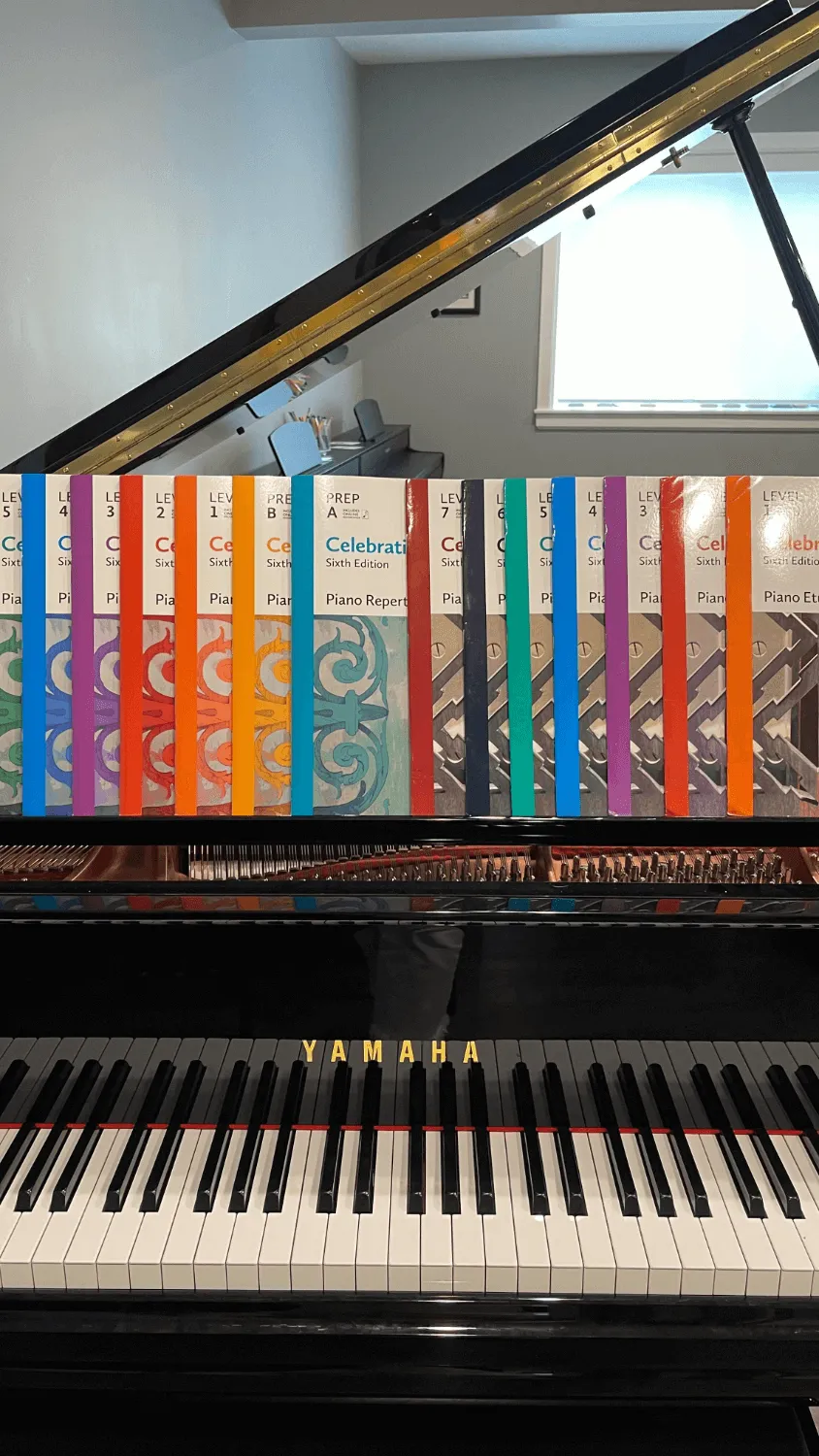 piano and books of sheet music