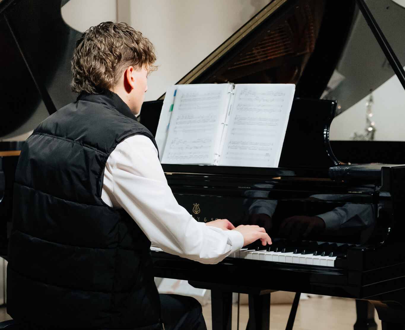 Students at the annual Silent Film Celebration accompanying a film on piano