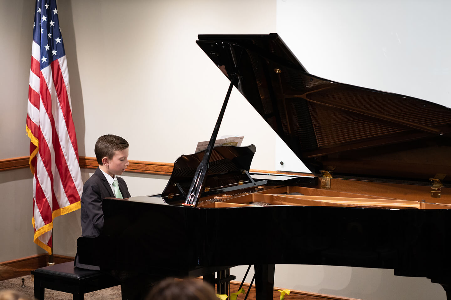 Piano student receiving a Royal Conservatory of Music certification award
