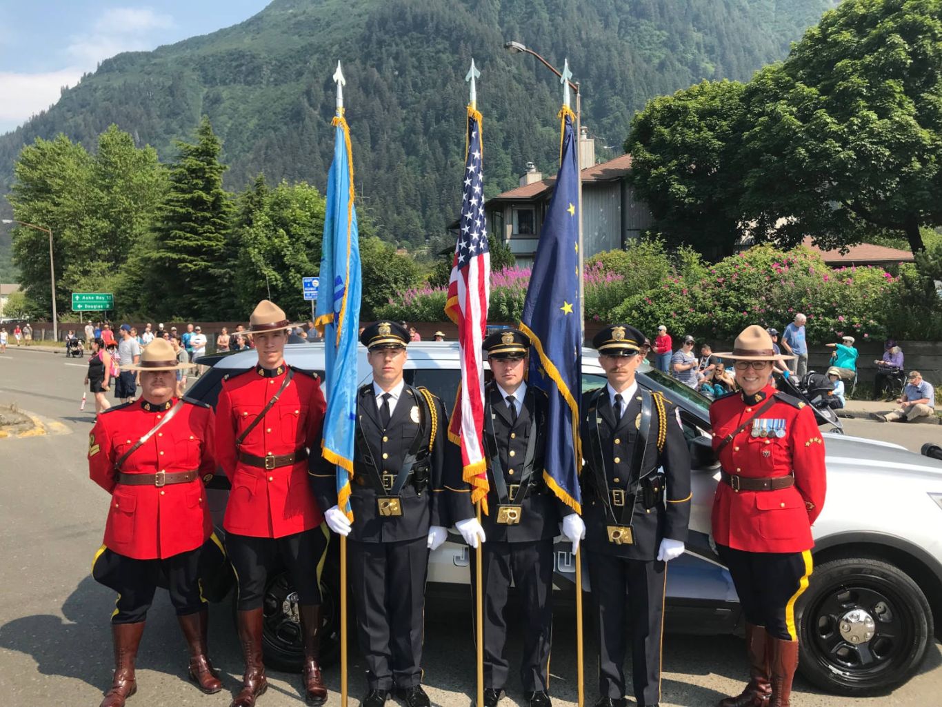 6 police officers with flags