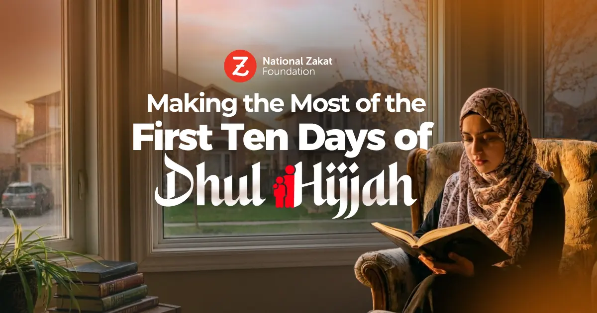 A woman in a headscarf reads a book by a window at sunset. Text reads, "Making the Most of the First Ten Days of Dhul Hijjah" by National Zakat Foundation.
