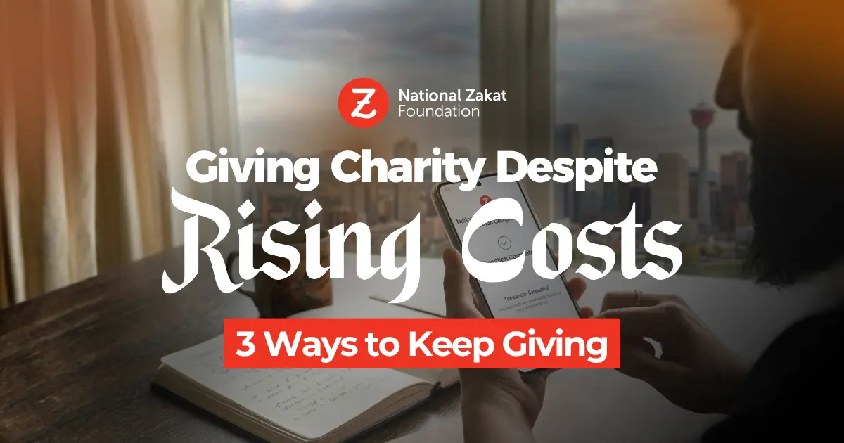 A person holds a phone with the National Zakat Foundation logo. Text overlay reads 'Giving Charity Despite Rising Costs - 3 Ways to Keep Giving.'