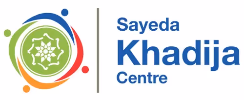 The logo for the Sayeda Khadija Centre features a circular emblem with a stylized floral pattern surrounded by colorful, interlocking arcs, next to the text "Sayeda Khadija Centre" in blue.