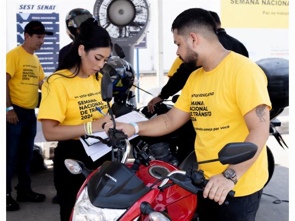 Realização do evento Pit Stop de conscientização de motociclistas