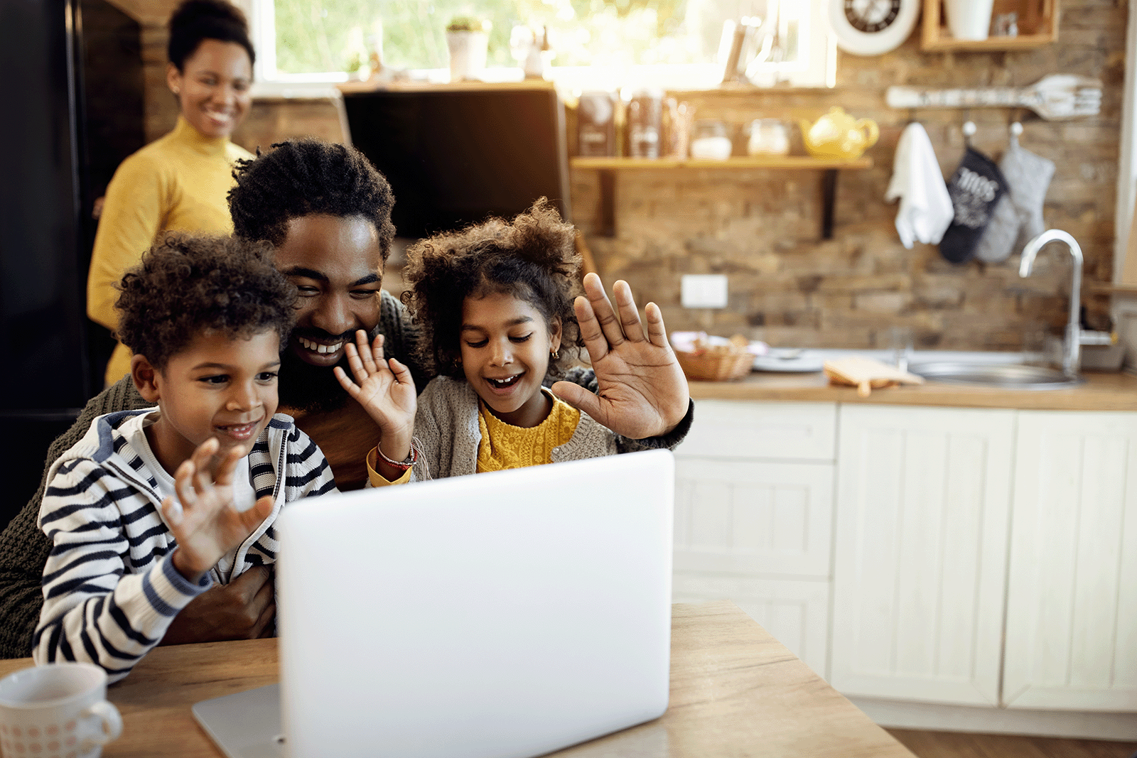 Family on a video call with relatives abroad