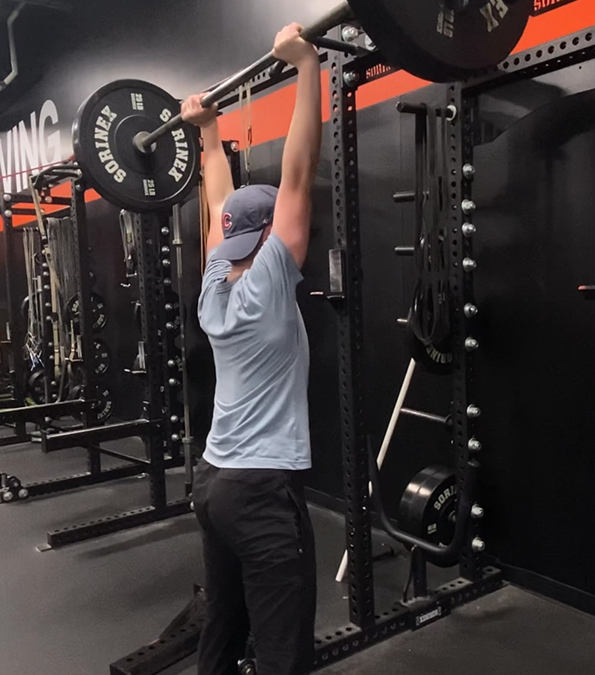Athlete doing overhead press