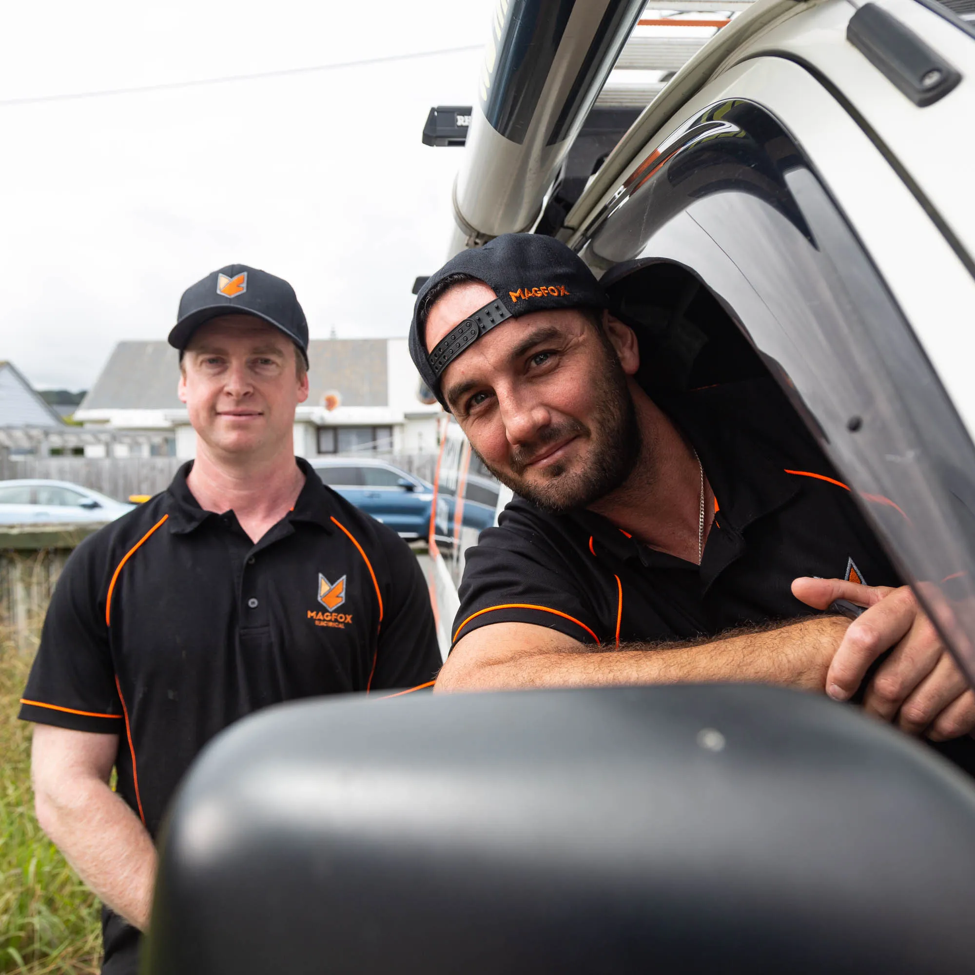 a couple of men in a car