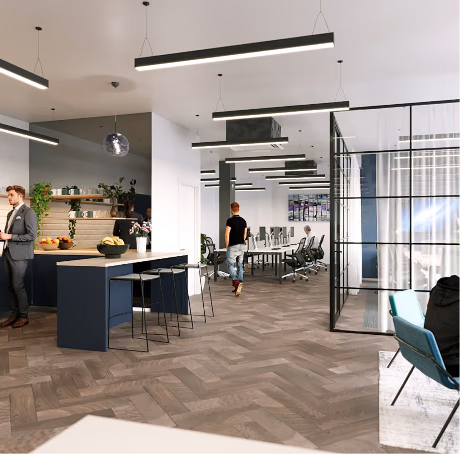 Modern office interior with wooden herringbone floor, blue island counter with stools, people working, and glass-walled meeting room.