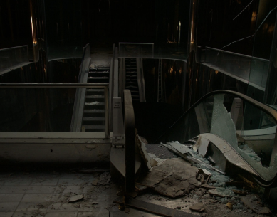 An abandoned mall that looks like a dystopian futurescape.