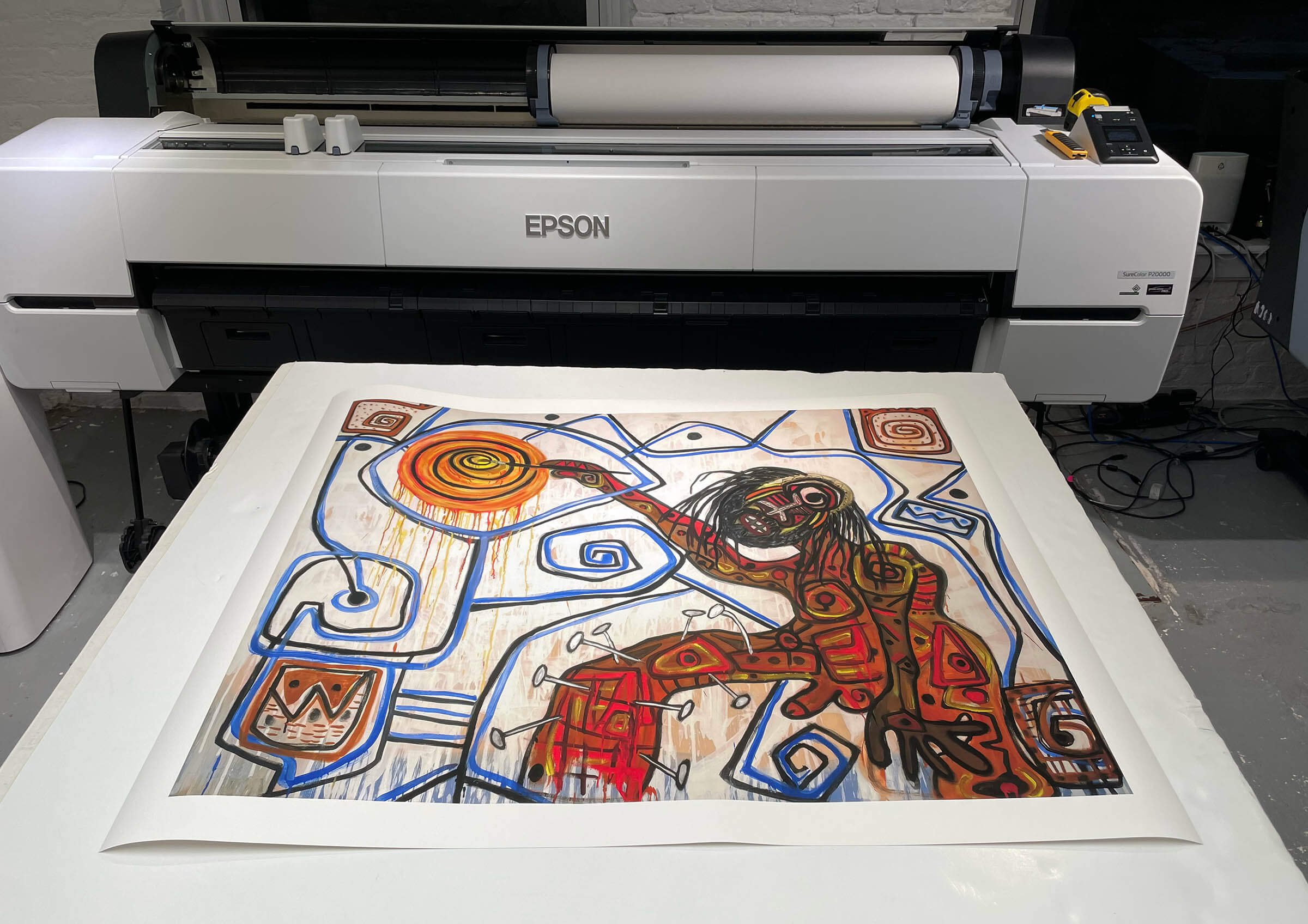 'The Painter', archival print reproduction laying out on a print table at our studio 
