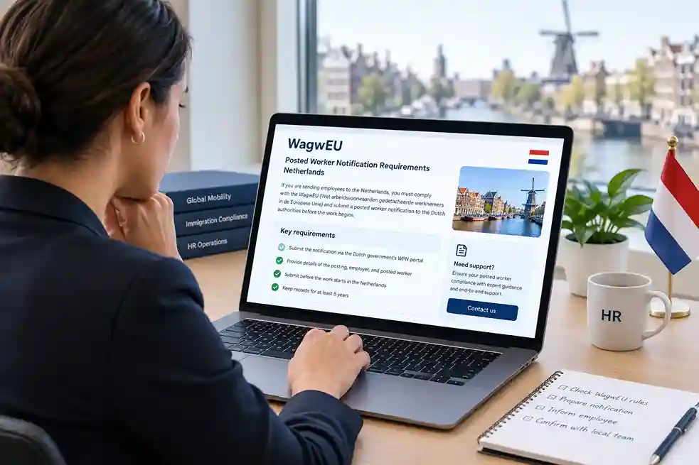 El responsable de RR. HH. revisa en un ordenador portátil los requisitos de notificación para los trabajadores desplazados en el marco del programa WagwEU en los Países Bajos.