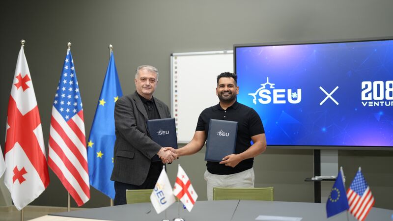 Representatives of SEU and 2080 Ventures mark their agreement.