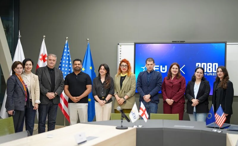 SEU and 2080 representatives marking their university partnership.