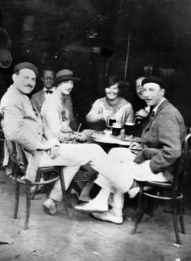 Paris cafe scene in the 1920s, illustrating the difference between creative identity and creative output.