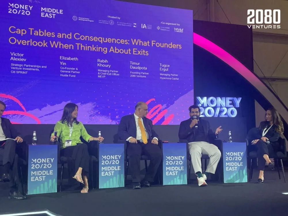 Timur speaking on a panel at Money20/20 Middle East