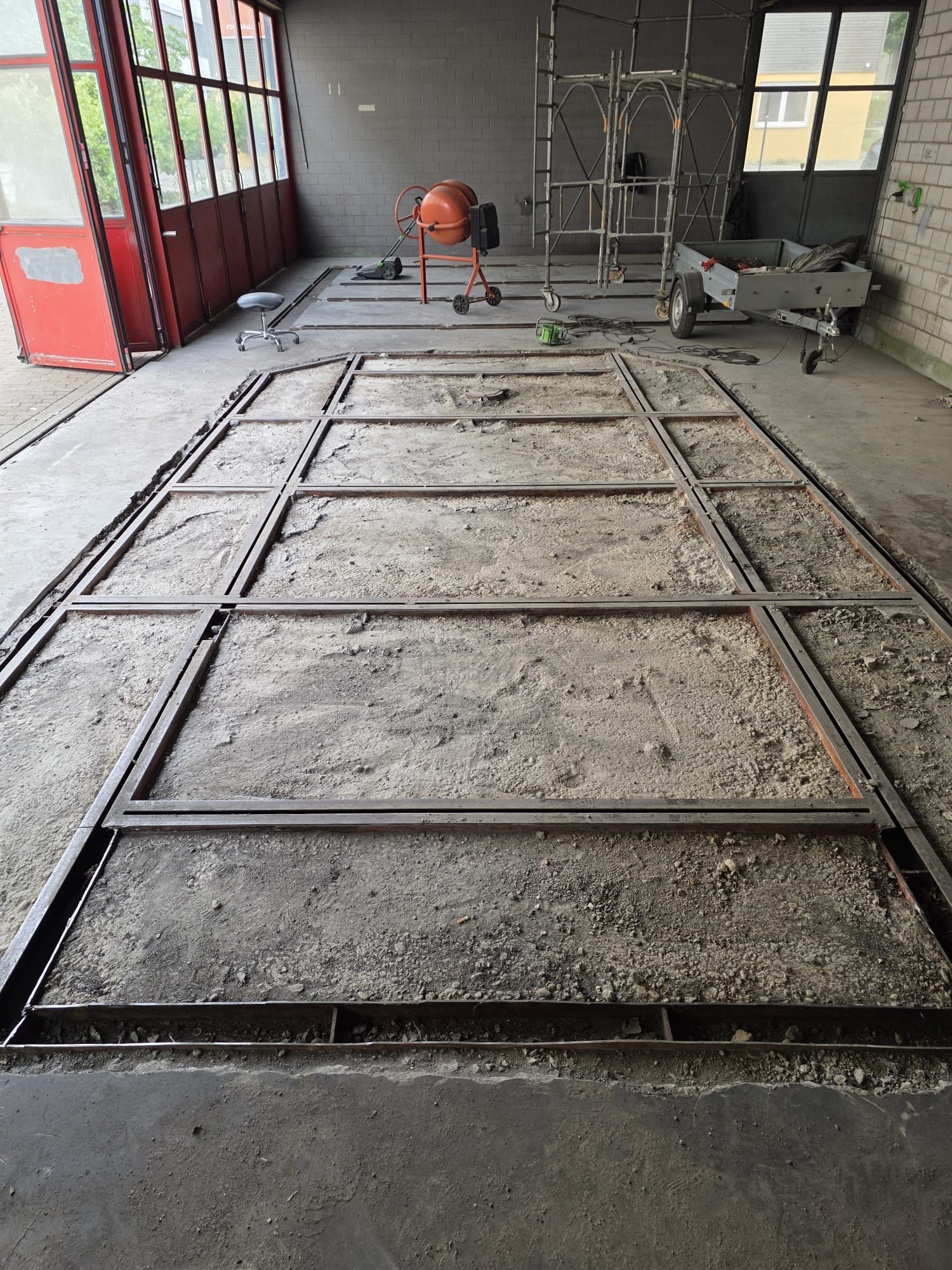 Exposed old steel frames in the workshop floor