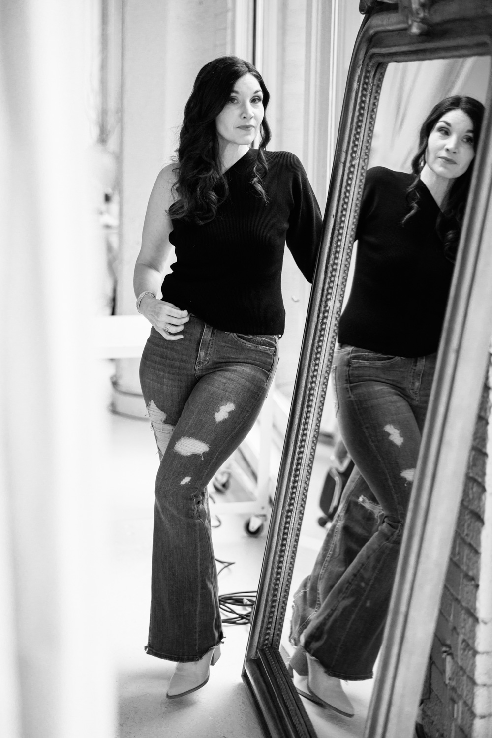 Photographer Molly Grace Bornfriend posing in studio
