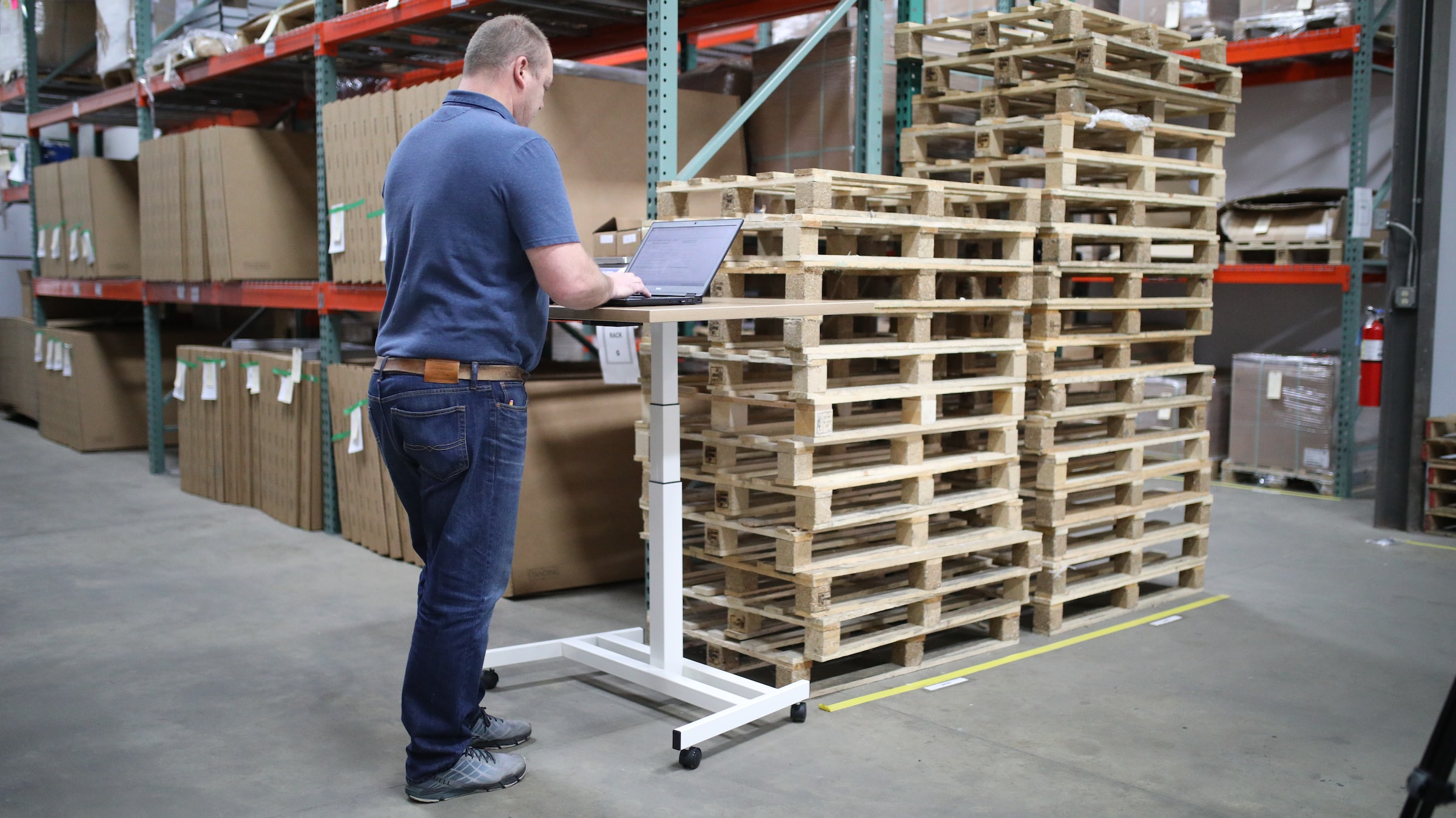 Pallets and corrugated cartons stored together in a warehouse