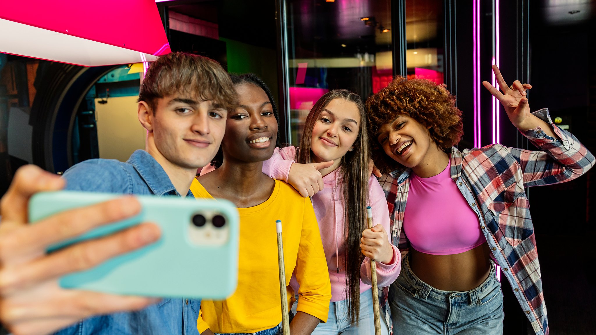group of young people at an FEC taking a photo